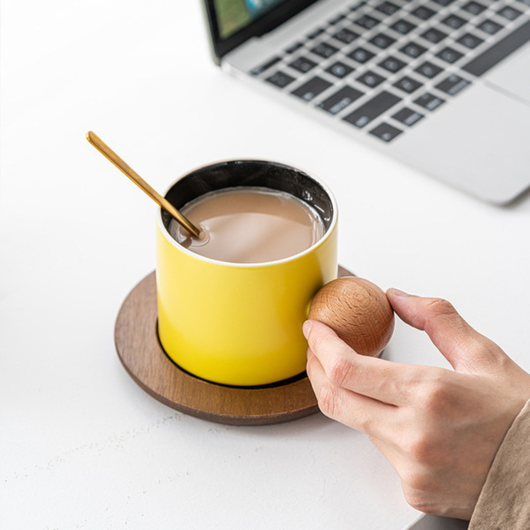 Stoneware Coffee Cup With Wooden Coaster & Golden Spoons