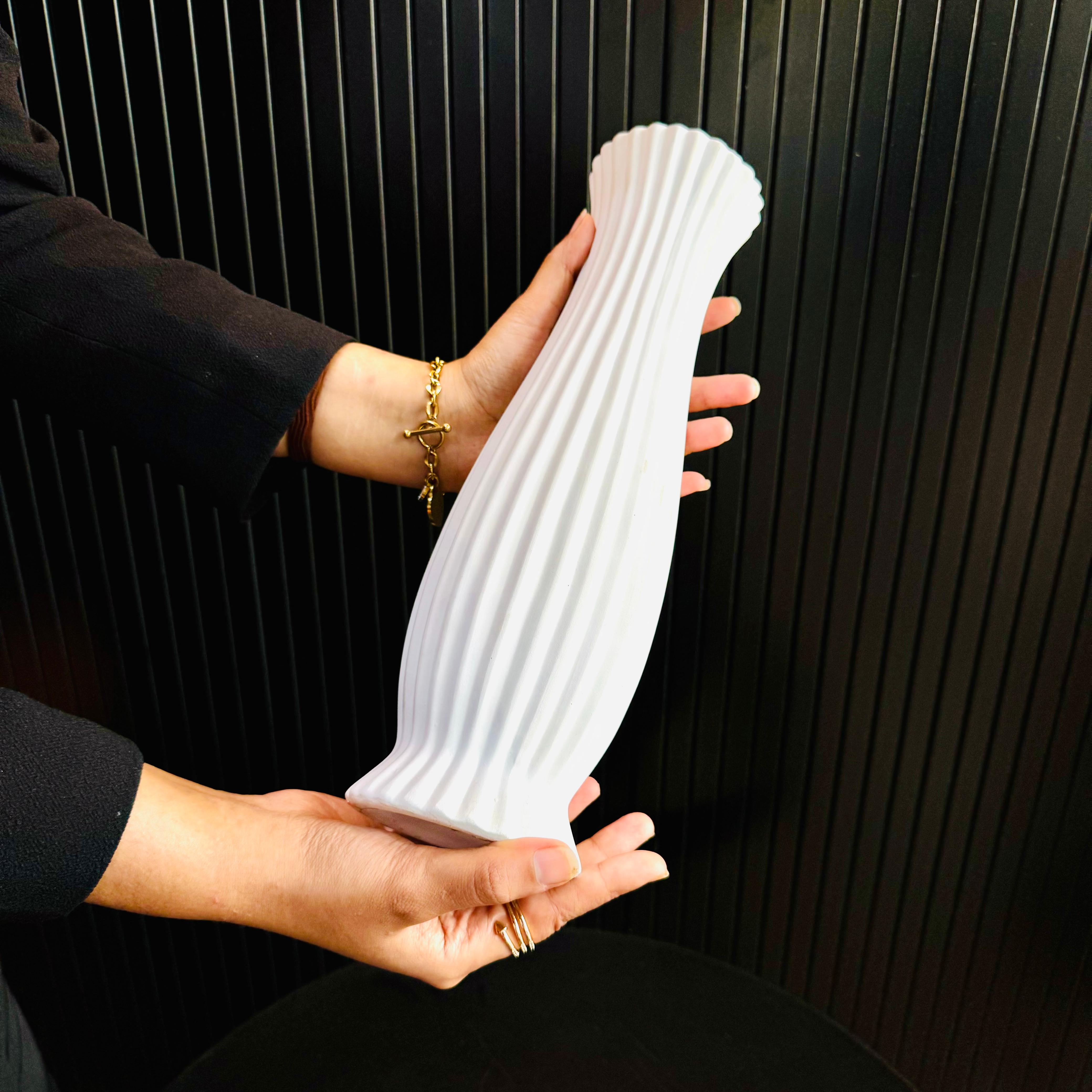 Sculpted glazed clay vase