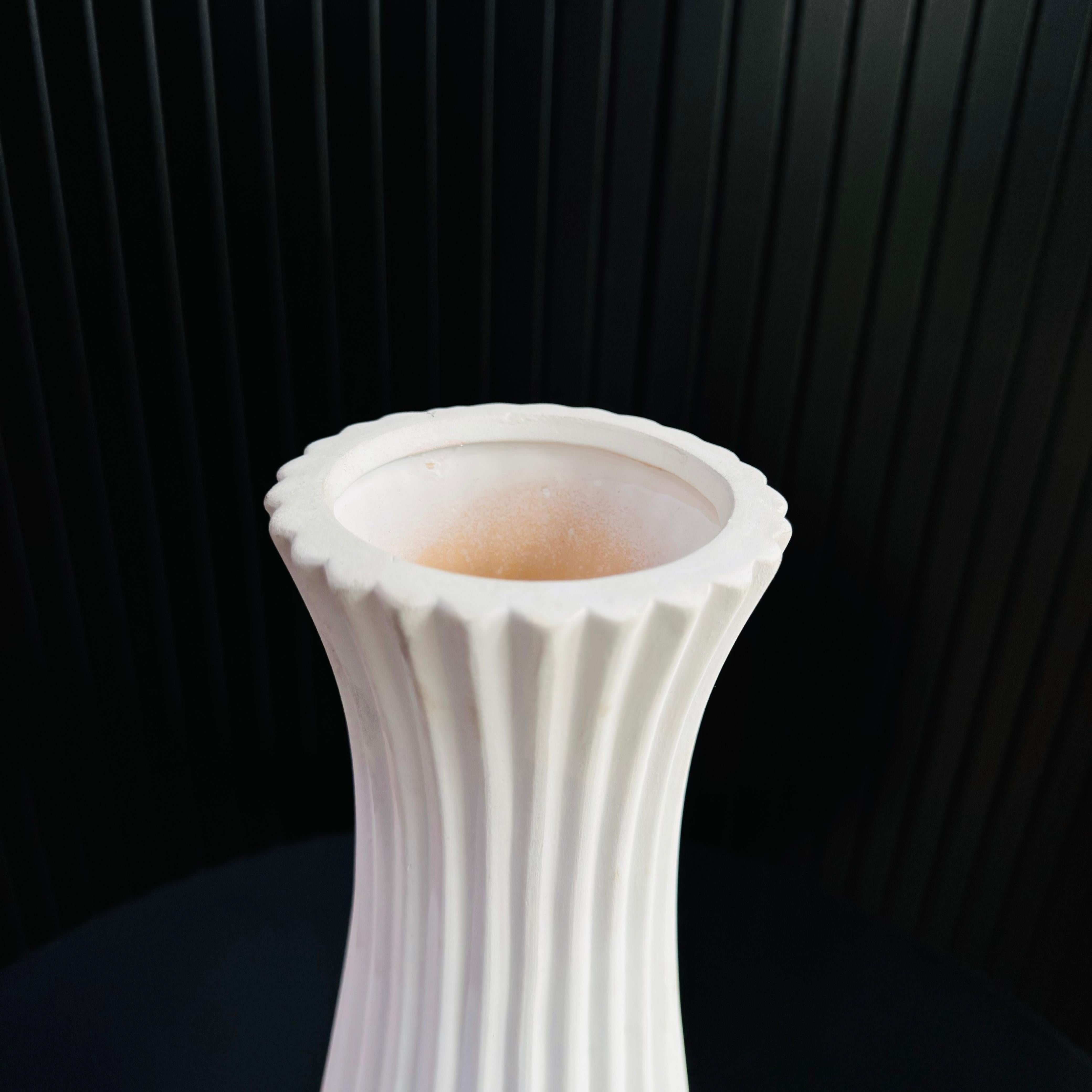 Sculpted glazed clay vase