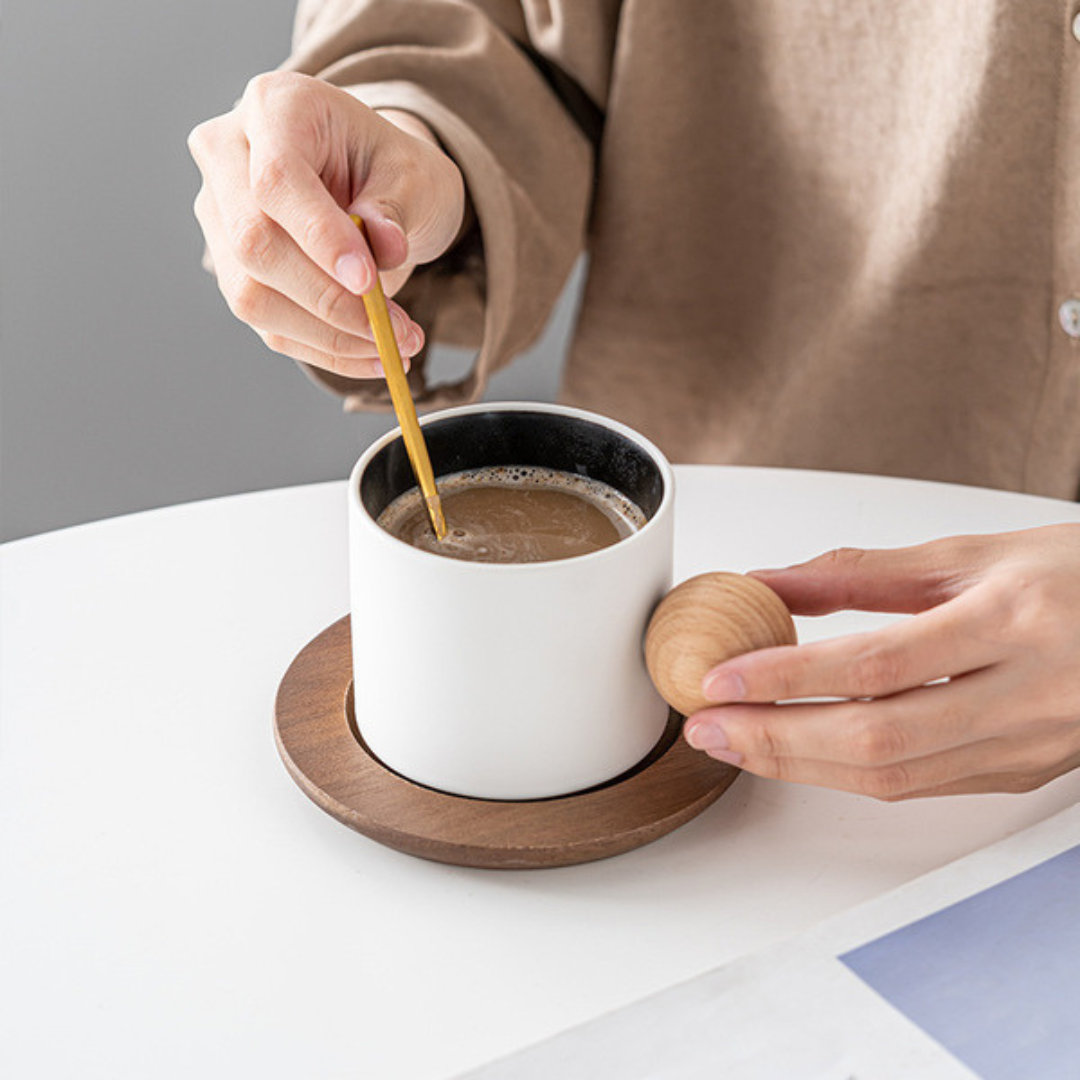 Stoneware Coffee Cup With Wooden Coaster & Golden Spoons